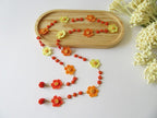 Sonnenuntergang Orange Gänseblümchen Halskette, Floral Boho Sommer Häkelschmuck, Bunte Perlen Lariat Halskette