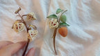 Gehäkelte Physalis Brosche Anstecknadel 8,5 cm * 5 cm / 8 cm * 5,5 cm DMC Baumwollfaden